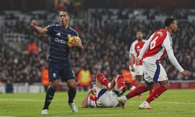 Aston Villa's Youri Tielemans, left, celebrates after scoring his side's opening goal during the English Premier League soccer match between Arsenal and Aston Villa at the Emirates Stadium in London, Saturday, Jan. 18, 2025. (AP Photo/ Dave Shopland)