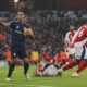 Aston Villa's Youri Tielemans, left, celebrates after scoring his side's opening goal during the English Premier League soccer match between Arsenal and Aston Villa at the Emirates Stadium in London, Saturday, Jan. 18, 2025. (AP Photo/ Dave Shopland)