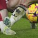 Manchester United's Alejandro Garnacho, right, and Liverpool's Diogo Jota fight for the ball during the English Premier League soccer match at the Anfield stadium in Liverpool, England, Sunday, Jan. 5, 2025. (AP Photo/Jon Super)