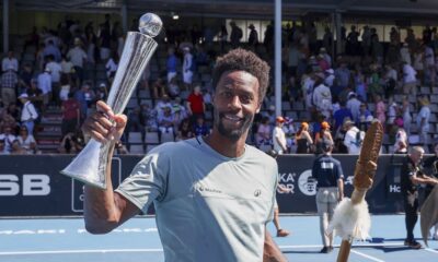 Gael Monfils of France holds up the trophy after defeating Zizou Bergs of Belgium to win the men's singles of the ASB Classic tennis tournament at Manuka Doctor Arena in Auckland, New Zealand, Saturday, Jan. 11, 2025. (David Rowland/Photosport via AP)