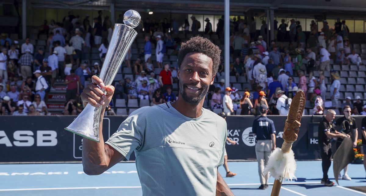 Gael Monfils of France holds up the trophy after defeating Zizou Bergs of Belgium to win the men's singles of the ASB Classic tennis tournament at Manuka Doctor Arena in Auckland, New Zealand, Saturday, Jan. 11, 2025. (David Rowland/Photosport via AP)