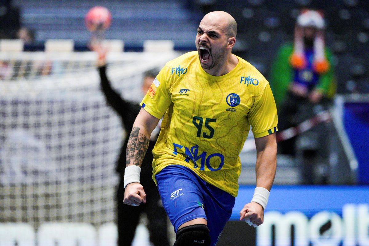 Brazil's Gustavo Rodrigues celebrates during the World Cup handball match between Brazil and Chile at the Unity Arena, in Fornebu, Norway, Wednesday, Jan. 22, 2025. (Stian Lysberg Solum /NTB Scanpix via AP)