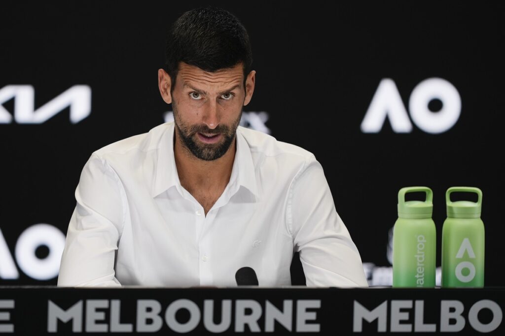 Serbia's Novak Djokovic reacts during a press conference ahead of the Australian Open tennis championship in Melbourne, Australia, Friday, Jan. 10, 2025. (AP Photo/Ng Han Guan)