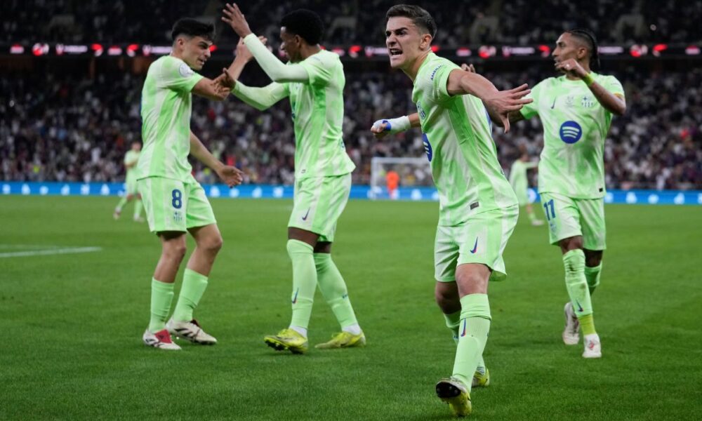 Barcelona's Gavi, front, celebrates after scoring during the Spanish Super Cup semifinal match between Athletic Bilbao and Barcelona in Jeddah, Saudi Arabia, on Wednesday, Jan. 8, 2025. (AP Photo/Altaf Qadri)