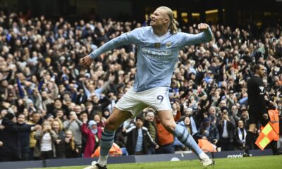 FILE -Manchester City's Erling Haaland celebrates with after scoring his side's second goal during the English Premier League soccer match between Manchester City and and Everton, at the Etihad stadium in Manchester, England, Feb. 10, 2024. (AP Photo/Rui Viera, File)