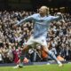 FILE -Manchester City's Erling Haaland celebrates with after scoring his side's second goal during the English Premier League soccer match between Manchester City and and Everton, at the Etihad stadium in Manchester, England, Feb. 10, 2024. (AP Photo/Rui Viera, File)