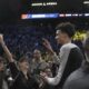 San Antonio Spurs center Victor Wembanyama, middle right, celebrates with fans after a Paris Games 2025 NBA basketball game between the Indiana Pacers and the Spurs in Paris, Thursday, Jan. 23, 2025. (AP Photo/Thibault Camus)