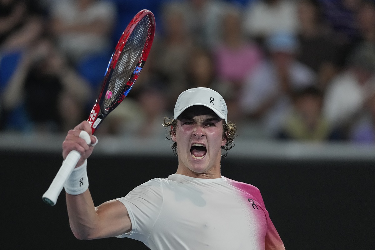 Joao Fonseca of Brazil celebrates after winning a point against Andrey Rublev of Russia during their first round match at the Australian Open tennis championship in Melbourne, Australia, Tuesday, Jan. 14, 2025. (AP Photo/Asanka Brendon Ratnayake)