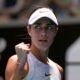 Olga Danilovic of Serbia returns a shot from Paula Badosa of Spain during their fourth round match at the Australian Open tennis championship in Melbourne, Australia, Sunday, Jan. 19, 2025. (AP Photo/Vincent Thian)