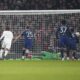 Manchester United's goalkeeper Altay Bayindir saves a penalty kick during the English FA Cup soccer match between Arsenal and Manchester United at the Emirates stadium in London, Sunday, Jan. 12, 2025. (AP Photo/Kin Cheung)