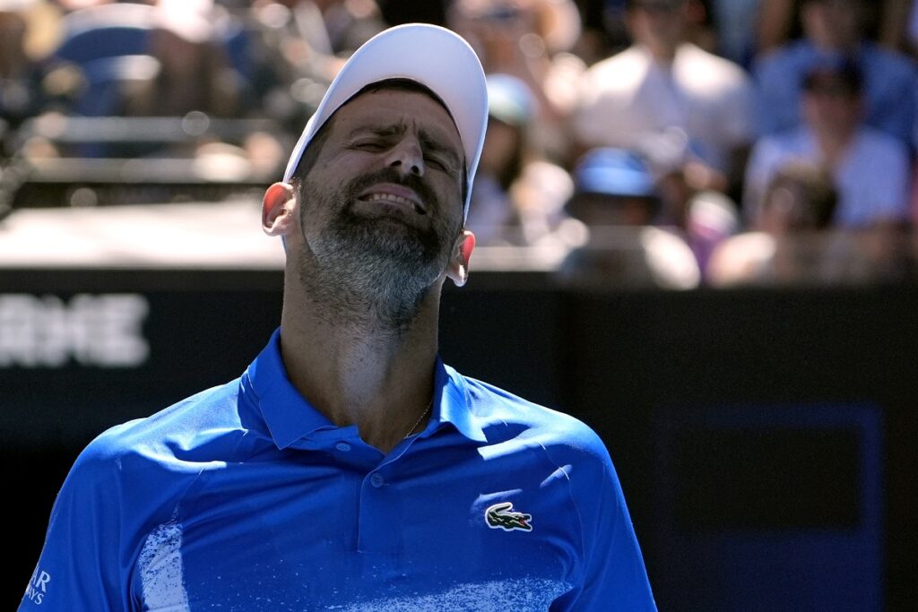 Novak Djokovic of Serbia reacts during his semifinal match against Alexander Zverev of Germany at the Australian Open tennis championship in Melbourne, Australia, Friday, Jan. 24, 2025. (AP Photo/Asanka Brendon Ratnayake)