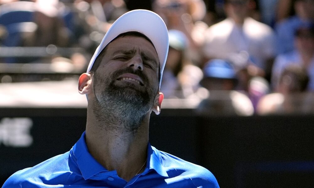 Novak Djokovic of Serbia reacts during his semifinal match against Alexander Zverev of Germany at the Australian Open tennis championship in Melbourne, Australia, Friday, Jan. 24, 2025. (AP Photo/Asanka Brendon Ratnayake)