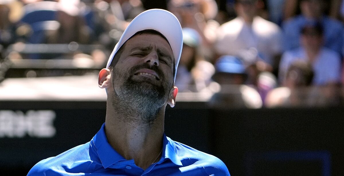 Novak Djokovic of Serbia reacts during his semifinal match against Alexander Zverev of Germany at the Australian Open tennis championship in Melbourne, Australia, Friday, Jan. 24, 2025. (AP Photo/Asanka Brendon Ratnayake)