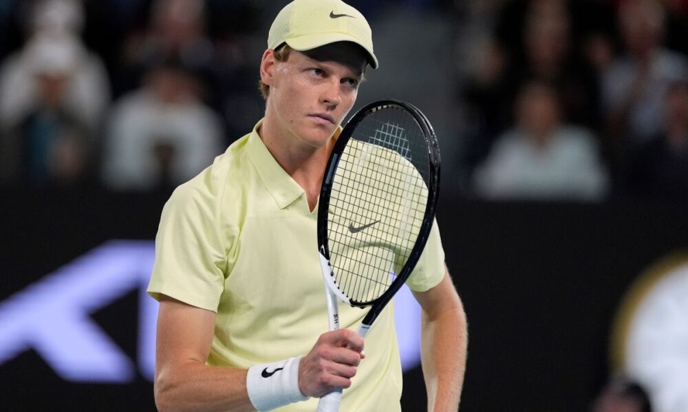 Jannik Sinner of Italy reacts during his quarterfinal match against Alex de Minaur of Australia at the Australian Open tennis championship in Melbourne, Australia, Wednesday, Jan. 22, 2025. (AP Photo/Asanka Brendon Ratnayake)