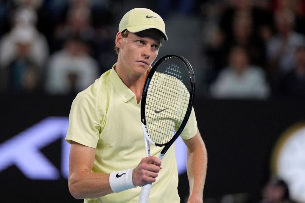 Jannik Sinner of Italy reacts during his quarterfinal match against Alex de Minaur of Australia at the Australian Open tennis championship in Melbourne, Australia, Wednesday, Jan. 22, 2025. (AP Photo/Asanka Brendon Ratnayake)