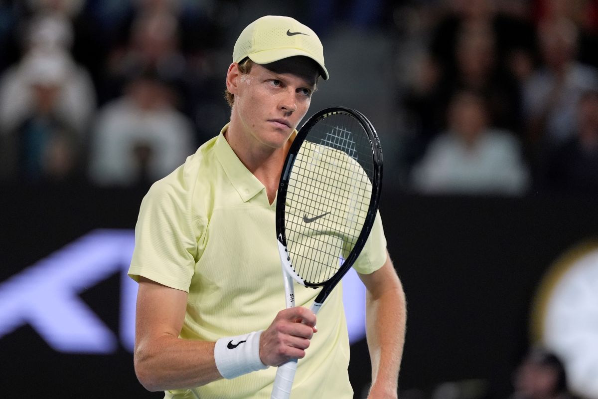 Jannik Sinner of Italy reacts during his quarterfinal match against Alex de Minaur of Australia at the Australian Open tennis championship in Melbourne, Australia, Wednesday, Jan. 22, 2025. (AP Photo/Asanka Brendon Ratnayake)