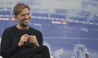 Former soccer coach Juergen Klopp, smiles during a press conference where he officially introduced as Global Head of Soccer at Red Bull in Salzburg, Austria, Tuesday, Jan. 14, 2025. (AP Photo/Haiko Mandl)