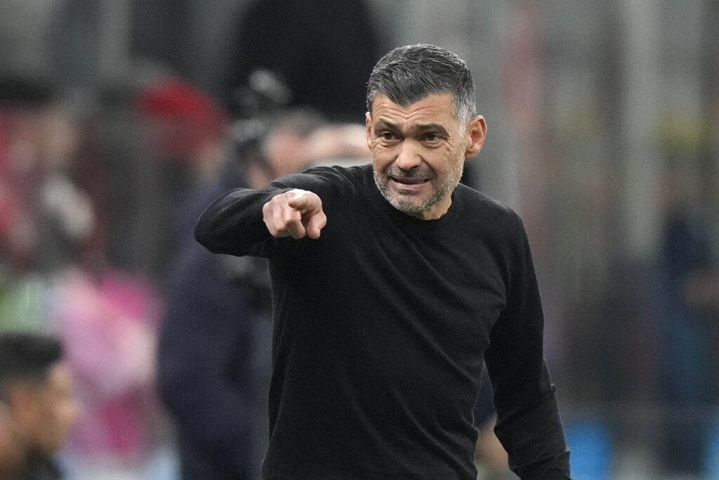 AC Milan's head coach Sergio Conceicao gestures from the sidelines during the Italian Serie A soccer match between AC Milan and Hellas Verona, at the San Siro Stadium in Milan, Italy, Saturday, Feb.15, 2025. (AP Photo/Luca Bruno)