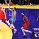 Golden State Warriors guard Stephen Curry shoots between Denver Nuggets center Nikola Jokic, left, and Indiana Pacers forward Pascal Siakam during the NBA All-Star basketball game Sunday, Feb. 16, 2025, in San Francisco. (AP Photo/Jed Jacobsohn)