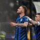 Inter Milan's Marko Arnautovic, left, celebrates with Inter Milan's Lautaro Martinez after scoring his side's second goal during the Serie A soccer match between Inter Milan and Fiorentina at the San Siro stadium, in Milan, Italy, Monday, Feb. 10, 2025. (AP Photo/Luca Bruno)