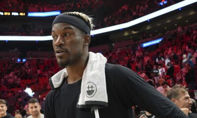 Miami Heat forward Jimmy Butler walks on the court after an NBA basketball game against the San Antonio Spurs, Sunday, Jan. 19, 2025, in Miami. (AP Photo/Lynne Sladky)