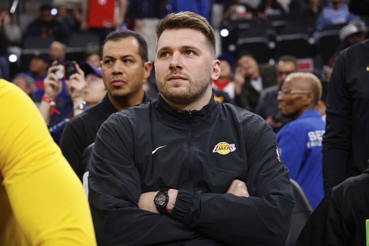 Los Angeles Lakers guard Luka Doncic sits on the bench before an NBA basketball game against the Los Angeles Clippers, Tuesday, Feb. 4, 2025, in Inglewood, Calif. (AP Photo/Kevork Djansezian)