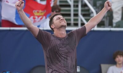 Miomir Kecmanovic of Serbia celebrates after defeating Alejandro Davidovich Fokina of Spain during the final match at the Delray Beach Open tennis tournament Sunday, Feb. 16, 2025, in Delray Beach, Fla. (AP Photo/Marta Lavandier)