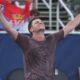 Miomir Kecmanovic of Serbia celebrates after defeating Alejandro Davidovich Fokina of Spain during the final match at the Delray Beach Open tennis tournament Sunday, Feb. 16, 2025, in Delray Beach, Fla. (AP Photo/Marta Lavandier)