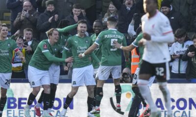 Plymouth Argyle's Ryan Hardie celebrates after scoring his side's opening goal from the penalty spot during the English FA Cup fourth round soccer match between Plymouth Argyle and Liverpool at Home Park stadium in Plymouth, England, Sunday, Feb. 9, 2025. (AP Photo/Alastair Grant)