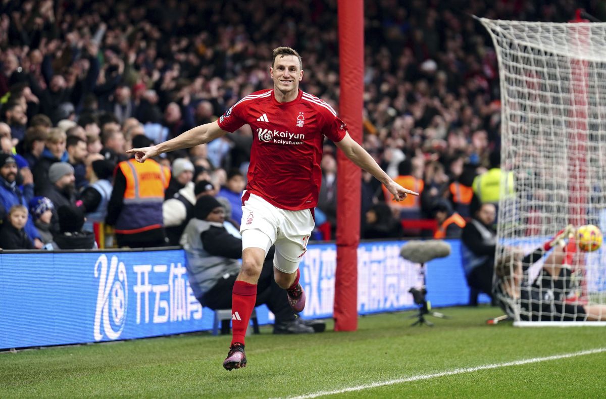 Nottingham Forest's Chris Wood celebrates after scoring his side's third goal of the game during the Premier League match between Brighton and Nottingham Forest at the City Ground, Nottingham, England, Saturday Feb. 1, 2025. (Mike Egerton/PA via AP)