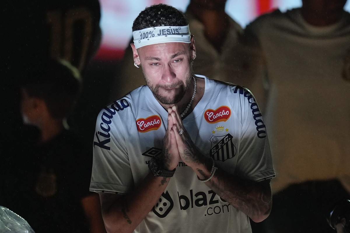 Brazilian soccer player Neymar reacts during his presentation ceremony after signing a six-month contract with Santos FC at Vila Belmiro Stadium in Santos, Brazil, Friday, Jan. 31, 2025. (AP Photo/Andre Penner)