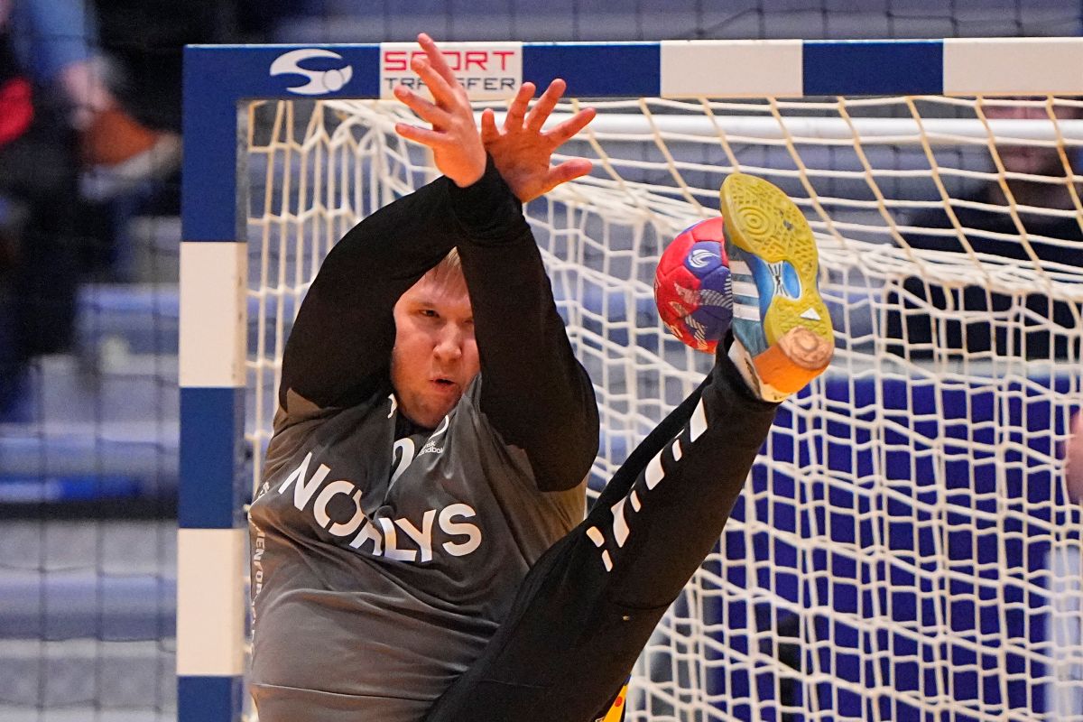 Denmark's goalkeeper Emil Nielsen makes a save during a semifinal match between Denmark and Portugal at the Handball World Championship at Unity Arena in Oslo, Norway, Friday, Jan. 31, 2025. (Bo Amstrup/Ritzau Scanpix via AP)