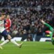 Tottenham's James Maddison scores the opening goal past Manchester United's goalkeeper Andre Onana during the English Premier League soccer match between Tottenham Hotspur and Manchester United in London, Sunday, Feb. 16, 2025. (AP Photo/Ian Walton)