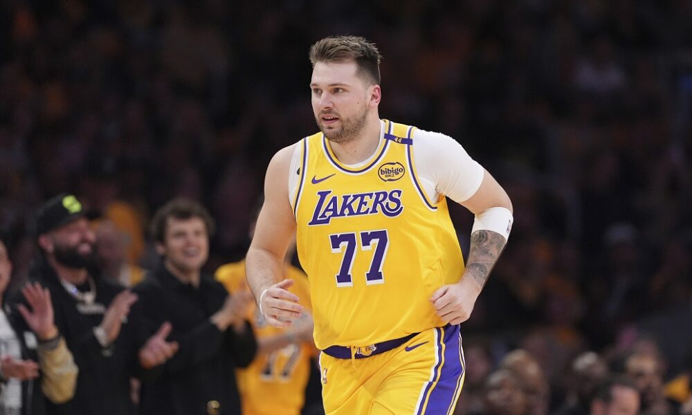 Los Angeles Lakers guard Luka Doncic runs during the second half of an NBA basketball game against the Utah Jazz, Monday, Feb. 10, 2025, in Los Angeles. (AP Photo/Mark J. Terrill)