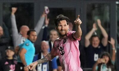 Inter Miami forward Lionel Messi (10) celebrates scoring his side's first goal against Sporting Kansas City during the first half of a CONCACAF Champions Cup soccer match, Tuesday, Feb. 25, 2025, in Fort Lauderdale, Fla. (AP Photo/Rebecca Blackwell)