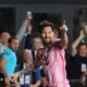 Inter Miami forward Lionel Messi (10) celebrates scoring his side's first goal against Sporting Kansas City during the first half of a CONCACAF Champions Cup soccer match, Tuesday, Feb. 25, 2025, in Fort Lauderdale, Fla. (AP Photo/Rebecca Blackwell)