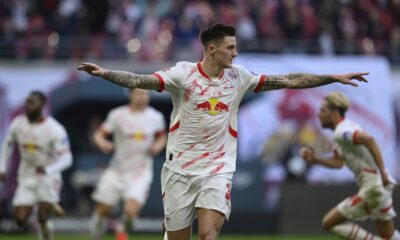 Leipzig's Benjamin Sesko celebrates after scoring his side's second goal during the German Bundesliga soccer match between RB Leipzig and 1. FC Heidenheim in Leipzig, Germany, Sunday, Feb. 23, 2025. (Hendrik Schmidt/dpa via AP)