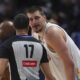 Denver Nuggets center Nikola Jokic, back, argues for a call with referee Jonathan Sterling in the second half of an NBA basketball game against the New Orleans Pelicans Wednesday, Feb. 5, 2025, in Denver. (AP Photo/David Zalubowski)