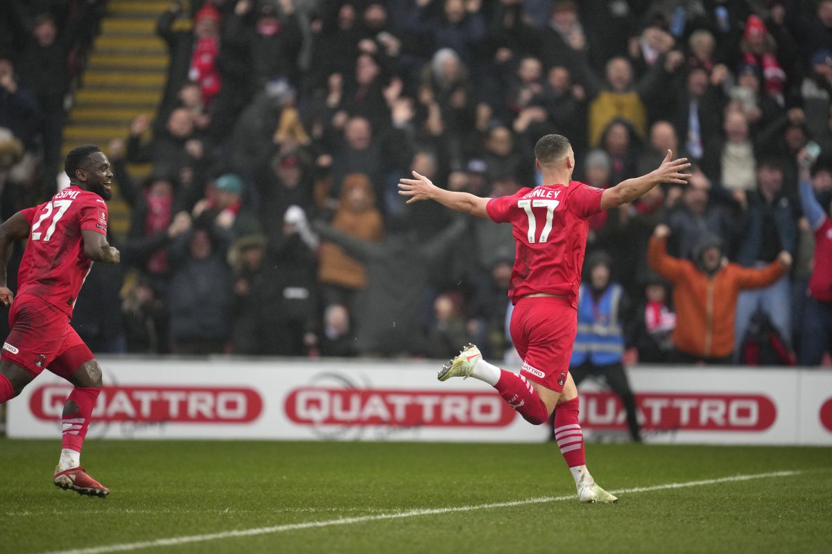 Leyton Orient's Jamie Donley celebrate during the English FA Cup fourth round soccer match between Leyton Orient and Manchester City at the Gaughan Group Stadium in London, England, Saturday, Feb. 8, 2025. (AP Photo/Kin Cheung)