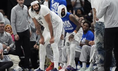 Dallas Mavericks forward Anthony Davis (3) waits for a time out in front of the bench during the third quarter of an NBA basketball game against the Houston Rockets Saturday, Feb. 8, 2025, in Dallas. (AP Photo/LM Otero)