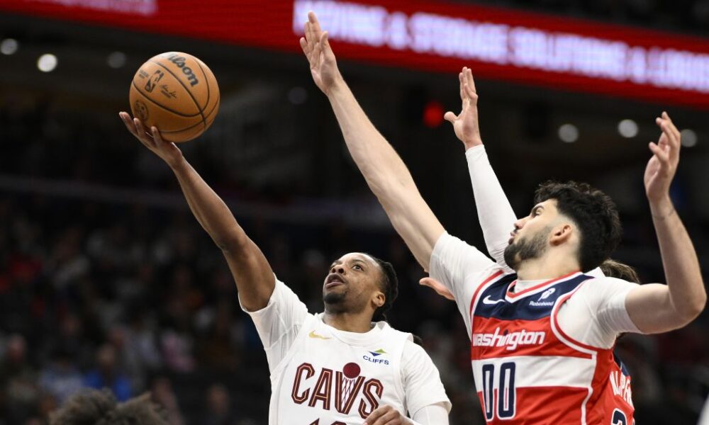 Cleveland Cavaliers guard Darius Garland (10) goes to the basket against Washington Wizards forward Tristan Vukcevic (00) during the first half of an NBA basketball game, Friday, Feb. 7, 2025, in Washington. (AP Photo/Nick Wass)