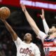 Cleveland Cavaliers guard Darius Garland (10) goes to the basket against Washington Wizards forward Tristan Vukcevic (00) during the first half of an NBA basketball game, Friday, Feb. 7, 2025, in Washington. (AP Photo/Nick Wass)