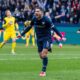 Bochum's Georgios Masouras celebrates after scoring his side's second goal during the German Bundesliga soccer match between VfL Bochum and Borussia Dortmund in Bochum, Germany, Saturday, Feb. 15, 2025. (David Inderlied/dpa via AP)