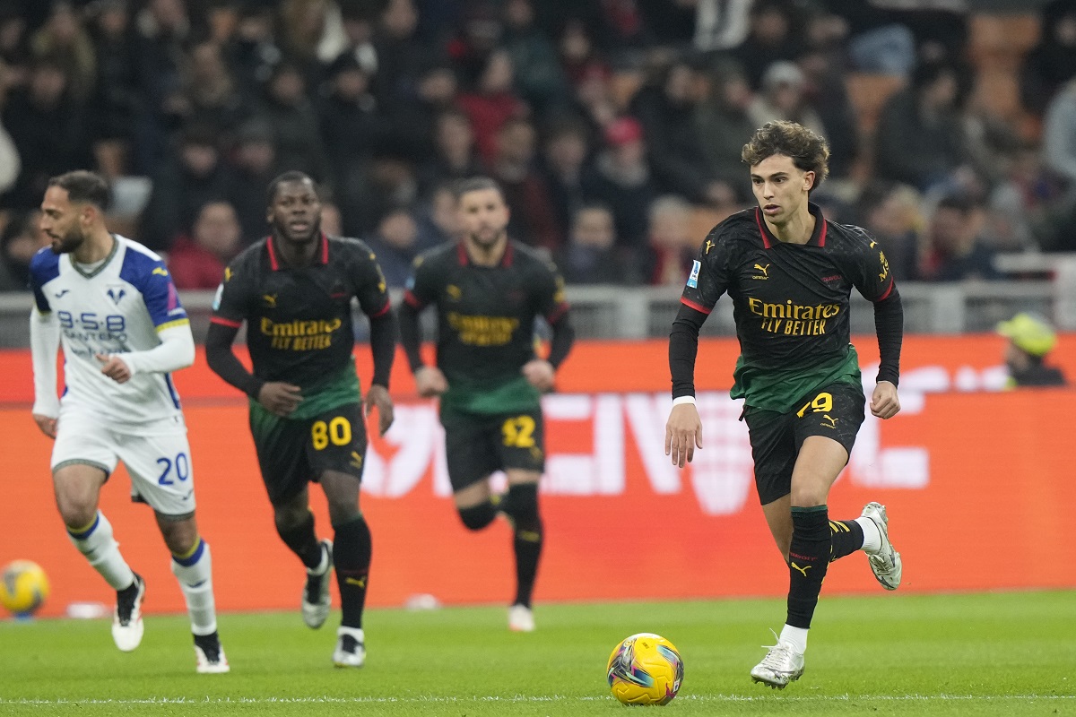 AC Milan's Joao Felix takes there ball forward during the Italian Serie A soccer match between AC Milan and Hellas Verona, at the San Siro Stadium in Milan, Italy, Saturday, Feb.15, 2025. (AP Photo/Luca Bruno)