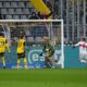 Stuttgart players celebrate after Dortmund's Waldemar Anton scored an own goal during the German Bundesliga soccer match between Borussia Dortmund and VfB Stuttgart at the Signal-Iduna Park in Dortmund, Germany, Saturday, Feb. 8, 2025. (AP Photo/Martin Meissner)