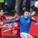 Bochum's Moritz Broschinski, left, and Kiel's David Zec in action during the Bundesliga soccer match between Holstein Kiel - VfL Bochum at the Holstein-Stadion, Kiel, Germany, Sunday Feb. 9, 2025. (Frank Molter/dpa via AP)