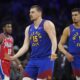 Denver Nuggets' Nikola Jokic reacts after scoring during the second half of an NBA basketball game against the Philadelphia 76ers, Friday, Jan. 31, 2025, in Philadelphia. (AP Photo/Matt Slocum)