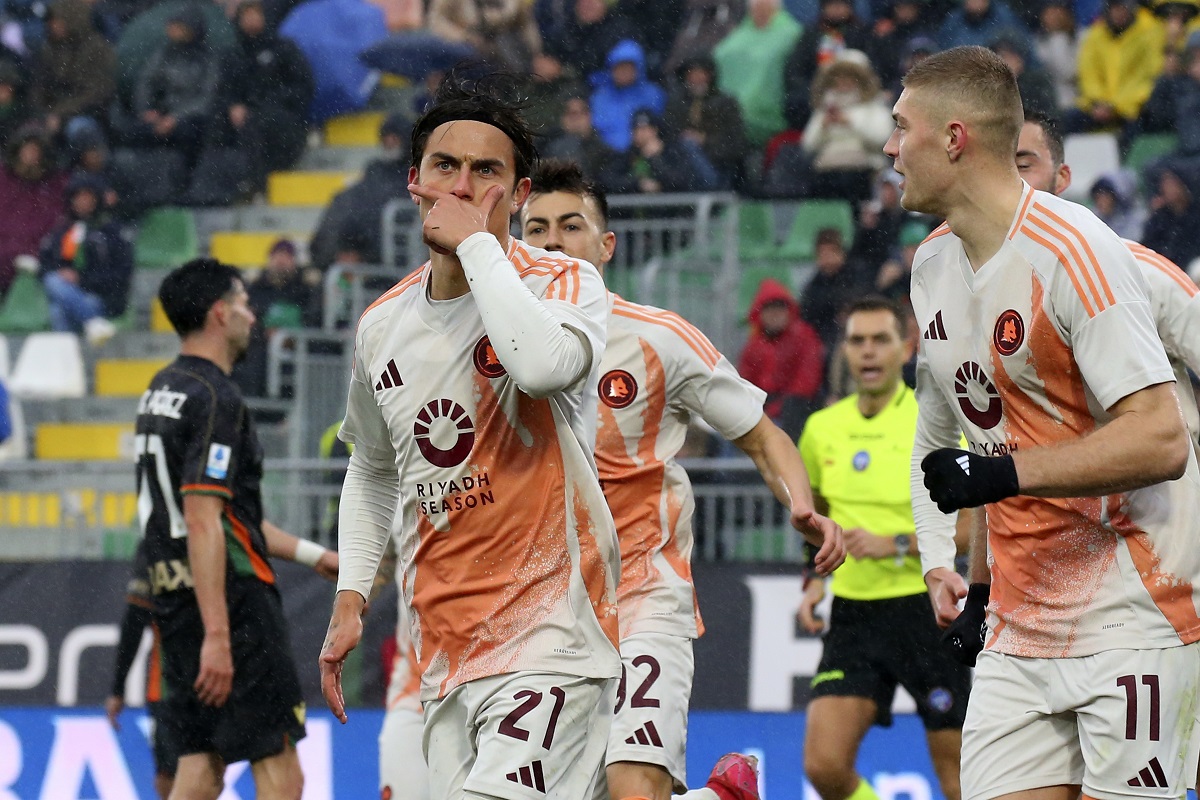 Roma's Paulo Dybala celebrates after scoring their side's first goal of the game during the Italian Serie A soccer match between Venezia and Roma at the Pier Luigi Penzo Stadium, in Venice, Italy, Sunday Feb. 9, 2025. (Paola Garbuio/LaPresse via AP)