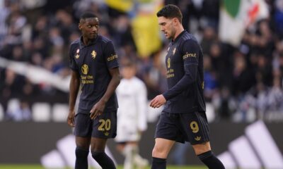 Juventus' Kolo Muani Randal, left, and Dusan Vlahovic walk on the field scored during the Serie A soccer match between Juventus and Empoli at the Juventus Stadium in Turin, Italy, Sunday, Feb. 2, 2024. (Fabio Ferrari/LaPresse via AP)