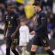 Juventus' Kolo Muani Randal, left, and Dusan Vlahovic walk on the field scored during the Serie A soccer match between Juventus and Empoli at the Juventus Stadium in Turin, Italy, Sunday, Feb. 2, 2024. (Fabio Ferrari/LaPresse via AP)